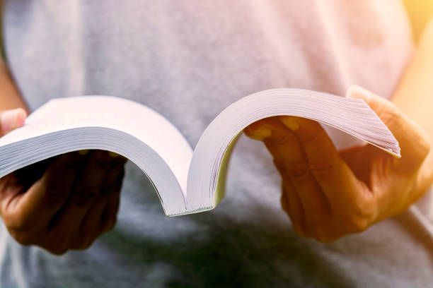 istock Man reading the book in the morning 961678334