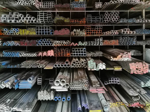 Rack of construction steel in warehouse, various sizes and shapes. Rack of construction steel in warehouse, various sizes and shapes. structural steel stock pictures, royalty-free photos & images