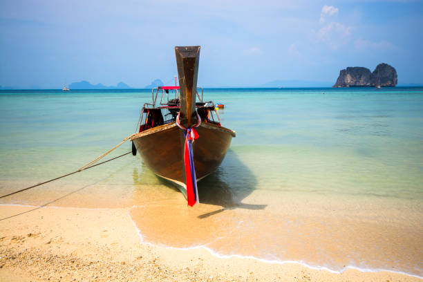 istock Wooden boat on the beach 961684408