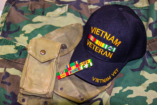 Vietnam Veteran Hat With, Service Ribbons & Original Pouches On Camouflage Uniform