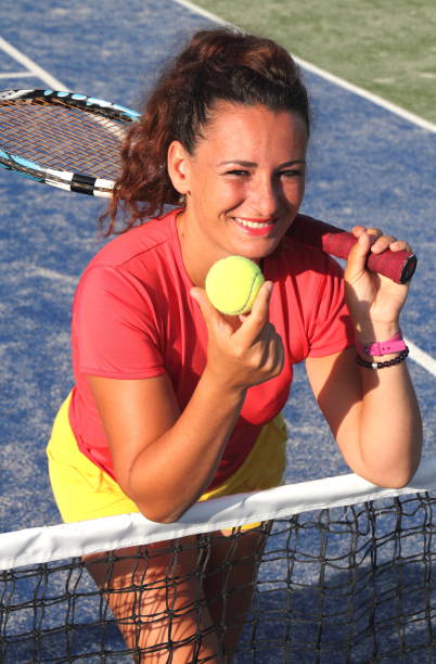 istock young tennis coach woman shooting 961687004