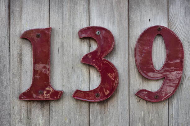 istock House number on wooden wall 961687532