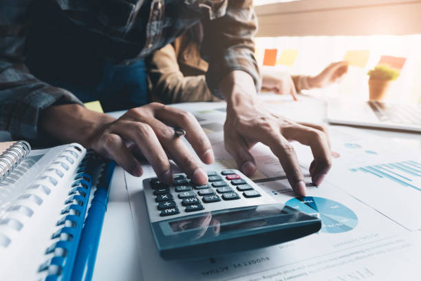 istock Business People Analyzing Statistics Business Documents for financial, Financial Concept 961694596