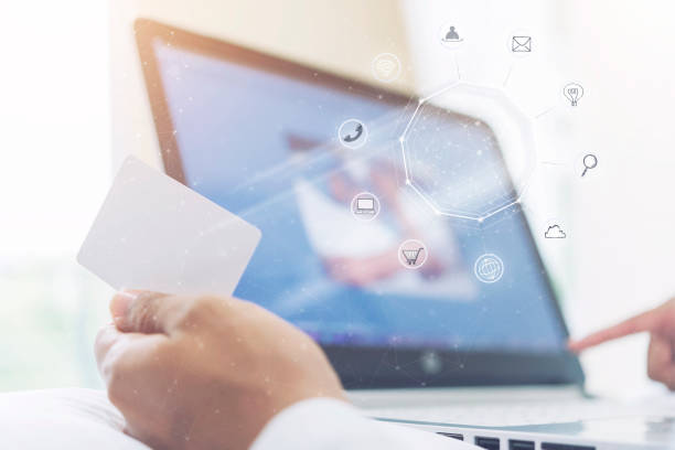 istock Online business technology concept. E-commerce, worldwide connection, global communication. Business people making payment, shopping, internet online transaction with credit card and computer laptop. 961694726