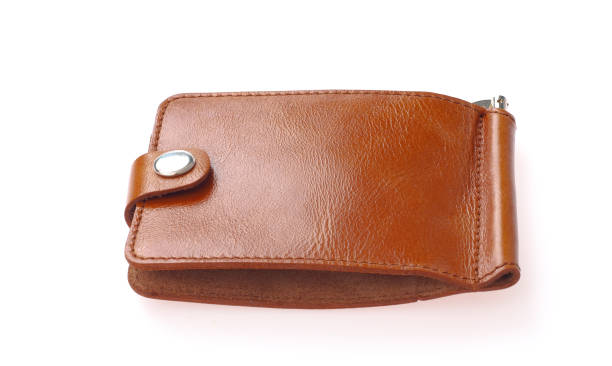 istock Brown natural leather wallet isolated on white background. Expensive man's purse closeup 961697740