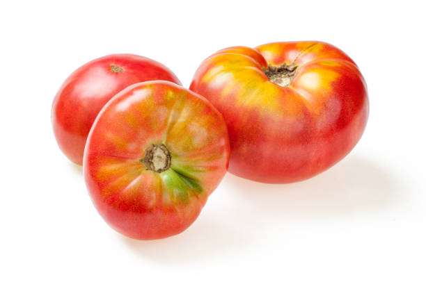 istock Delicious ripe tomatoes, isolated on white 961700584