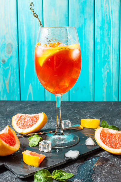 istock Cocktail drink on stone board. Alcoholic beverage with grapefruit and ice 961701458