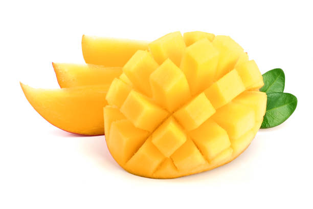 istock Mango fruit half with leaves and slices isolated on white background close-up 961701618