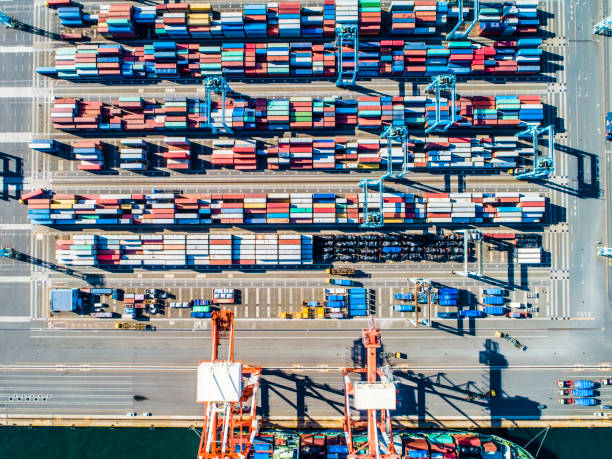 istock Containers of various colors are lined by the seaside. 961701724