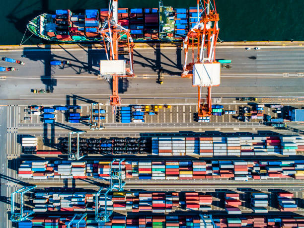 istock Containers of various colors are lined by the seaside. 961701822