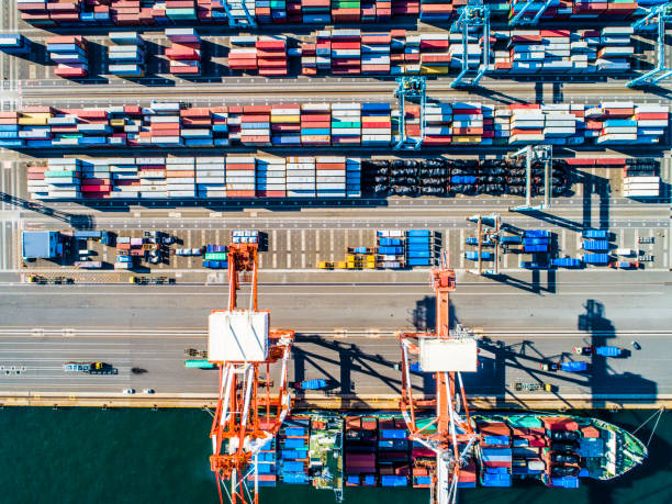 istock Containers of various colors are lined by the seaside. 961701874