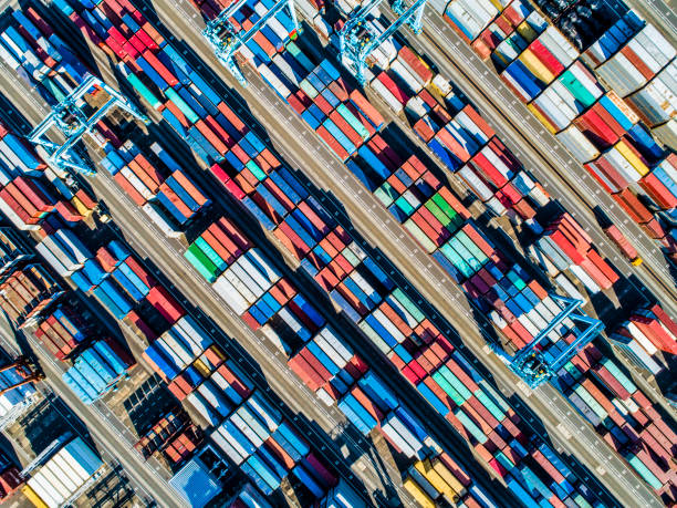 istock Containers of various colors are lined next to the sea. 961703188