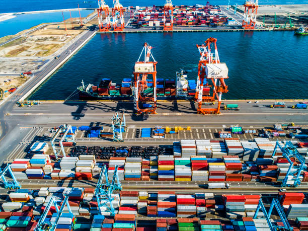 istock Containers of various colors are lined by the seaside. 961704126