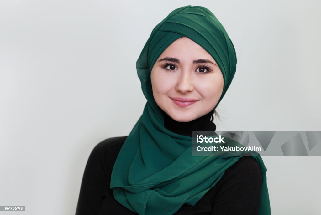 Smiling young Muslim woman in scarf Adult Stock Photo