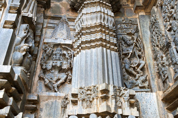 istock Ornate wall panel reliefs depicting (from left) dancing Kali (a form of Durga) and Shiva dancing on demon (Andhakasura), Chennakesava temple, Belur, Karnataka, india. 961709066