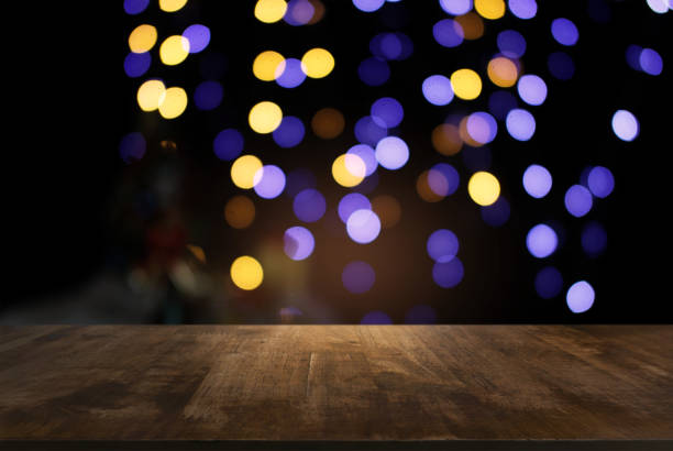 istock Empty dark wooden table in front of abstract blurred bokeh background of restaurant . can be used for display or montage your products.Mock up for space 961709480