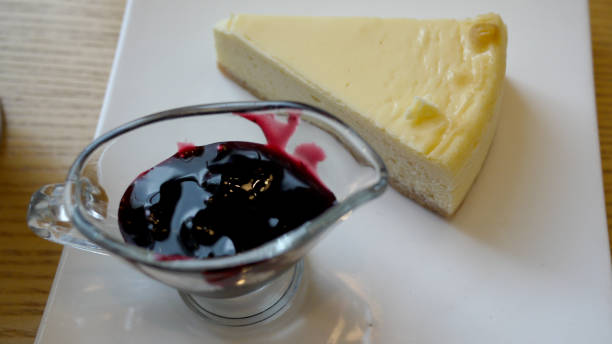 istock New York cheese cake with blueberry sauce 961714740
