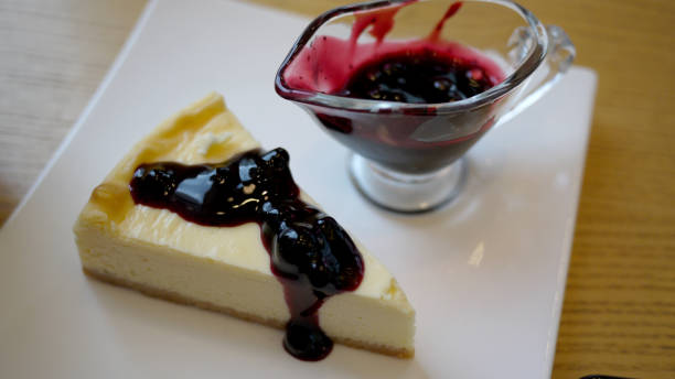 istock New York cheese cake with blueberry sauce 961714746