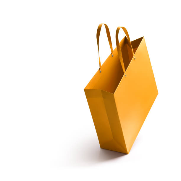 istock Gold shopping bag isolated on white background 961715610
