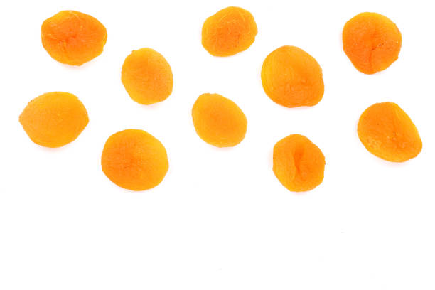 istock Dried apricots isolated on a white background with copy space for your text. Top view. Flat lay pattern 961716020