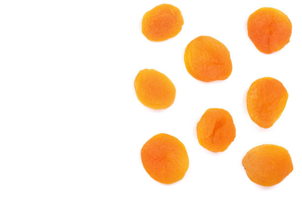 istock Dried apricots isolated on a white background with copy space for your text. Top view. Flat lay pattern 961716030