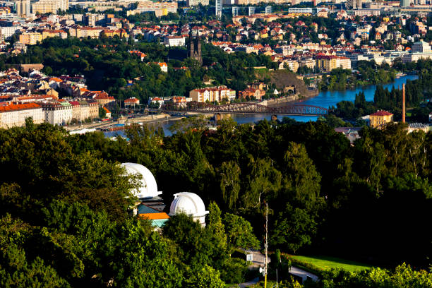a view of the stefanik observatory and vltava river in prague, czech republic. - stefanik observatory imagens e fotografias de stock