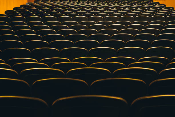 istock Seats in theatre Audience seat row indoor hall 961720084