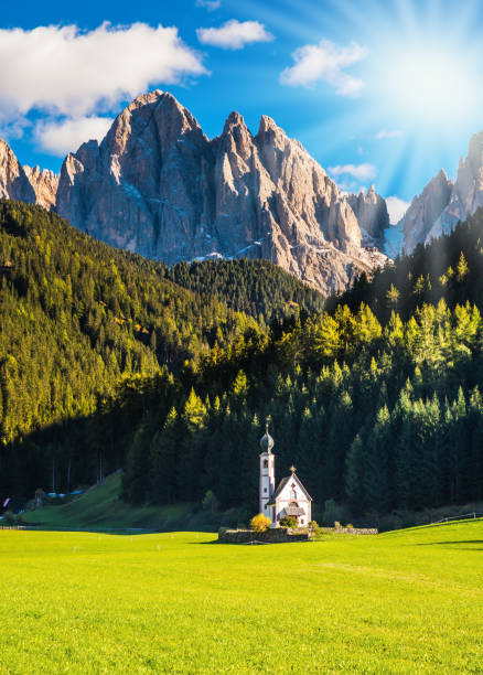 istock The sun illuminates green valley 961721042