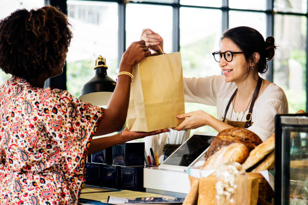istock Black customer buying bakery products 961721424