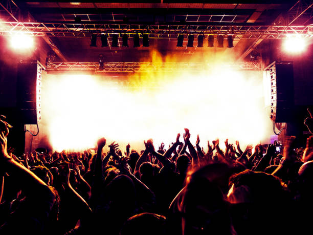 istock Concert hall with excited crowd 961724110