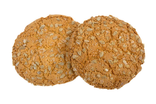 istock round cookies with sunflower seeds on white background 961725116