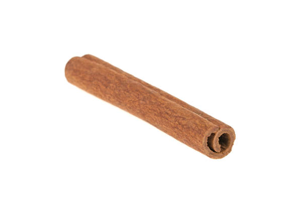 istock stick of cinnamon on white background 961725152