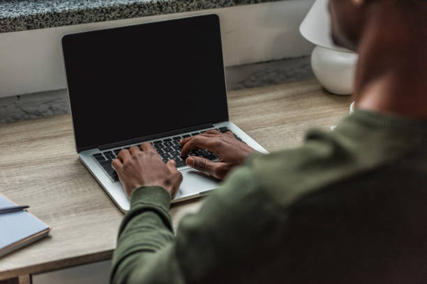istock african american man typing on laptop 961725666