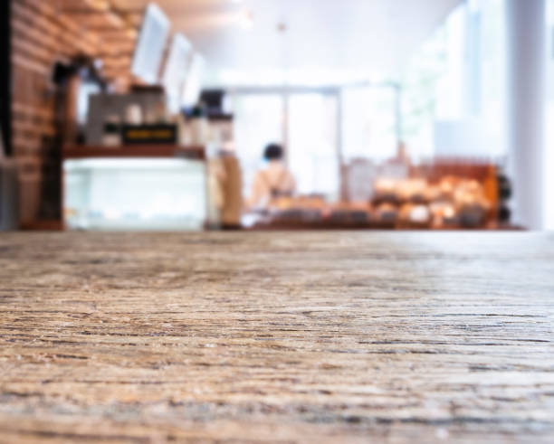 istock Table top counter with Blur Bar restaurant cafe interior background 961726798