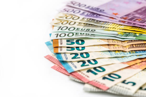 istock Euro banknotes in fan isolated on white background 961726830