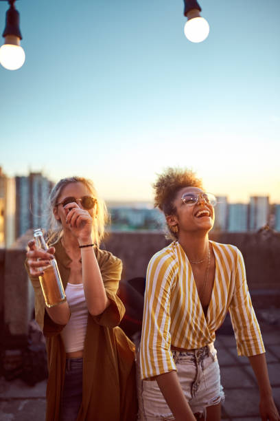 istock Two women dancing at the party. 961727104