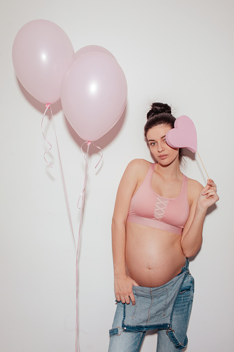 Portrait of a future mother who is expecting baby girl