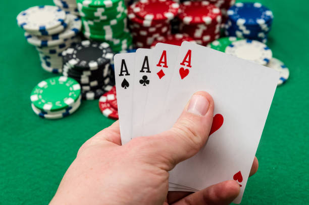 istock A poker player who holds playing cards 961731360
