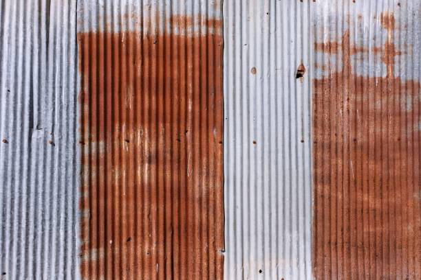 istock old rusty galvanized. wheathered rust and scratched steel texture corrugated iron siding vintage background 961736288