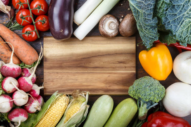 istock vegetable set.  fresh farmer's vegetables as background. 961737604