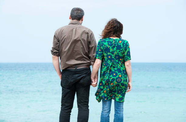 istock Loving couple hand in hand 961746976