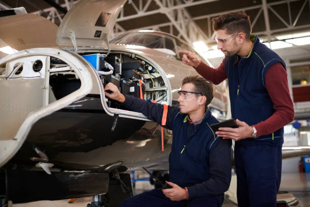 istock Aircraft mechanics in the hangar 961748294