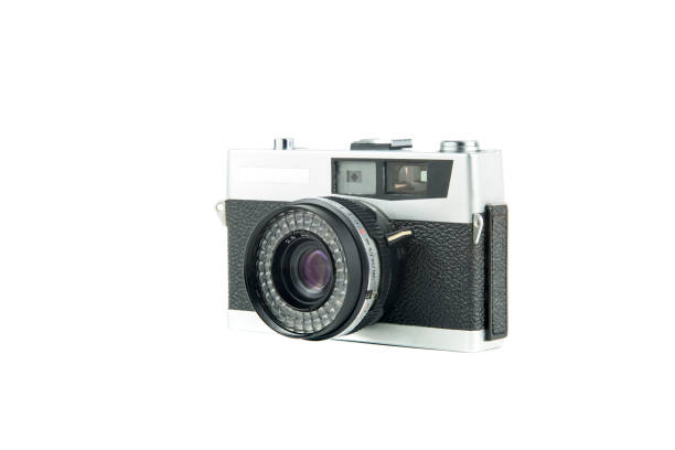 istock vintage film camera isolated in white background 961748646