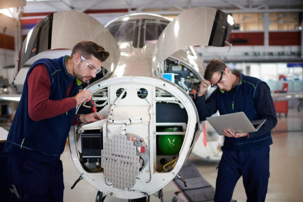 istock Aircraft mechanics in the hangar 961748888