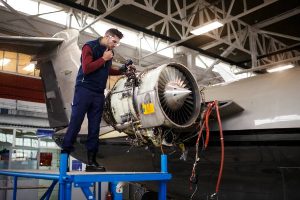 istock Aircraft mechnic in the hangar 961751174