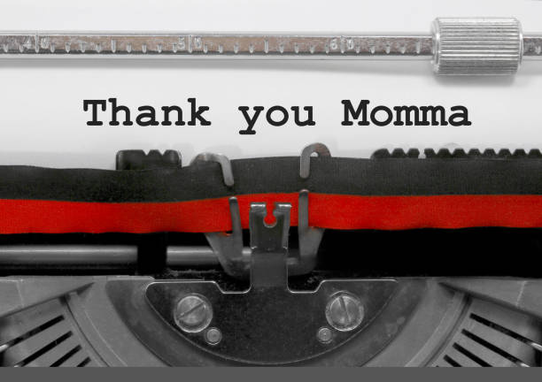 istock Thank you Momma phrase by the old typewriter on white paper 961752570
