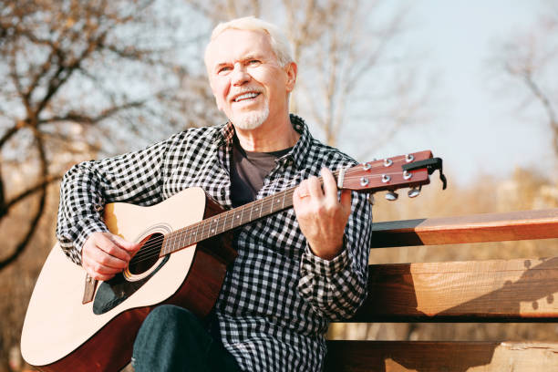 istock Pleased mature man unveiling his talent 961752912