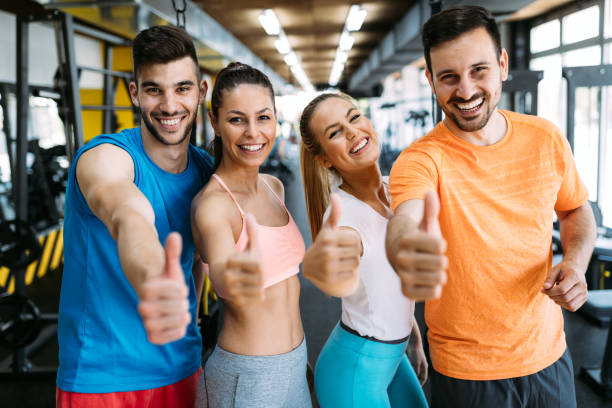 istock Group of people training in gym 961753030
