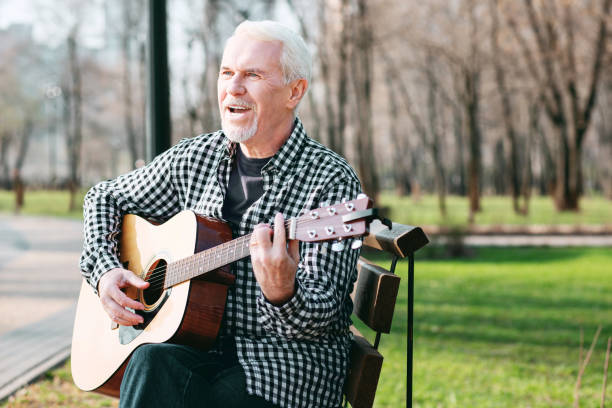 istock Talented mature man improving guitar skills 961753868