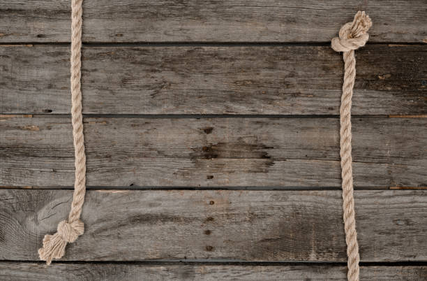 istock flat lay with marine ropes with knots on grunge wooden tabletop 961758228
